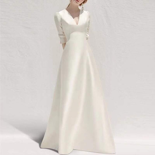 Vestido blanco estilo dama, de satén fino y de temperamento francés alto, con falda larga.